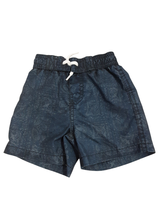 Patterned navy swim trunks size 6-12m